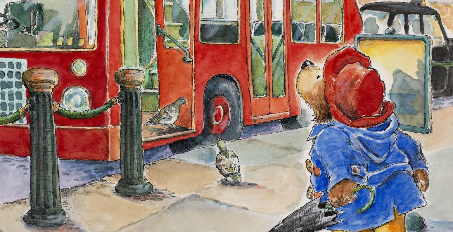 Illustration of Paddington looking at red bus. 