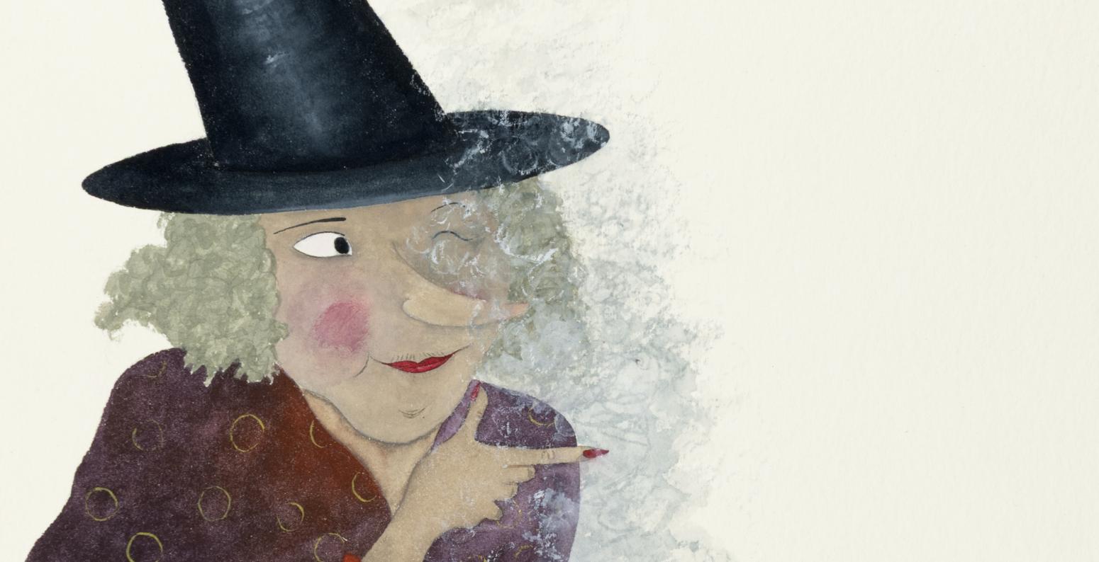 A witch standing above a boiling cauldron. 