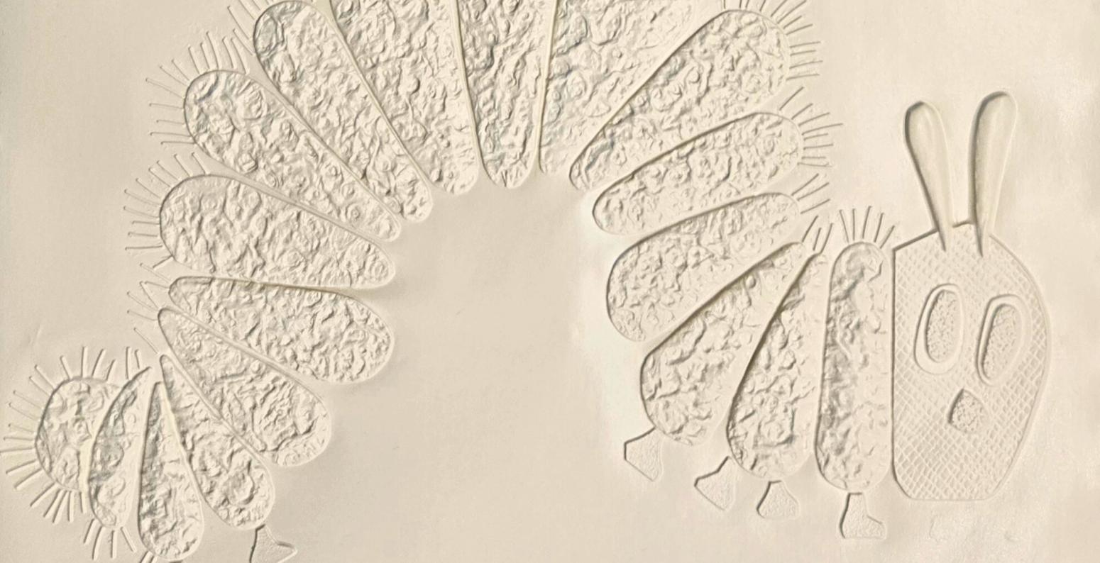 A braille illustration and text from The Very Hungry Caterpillar.