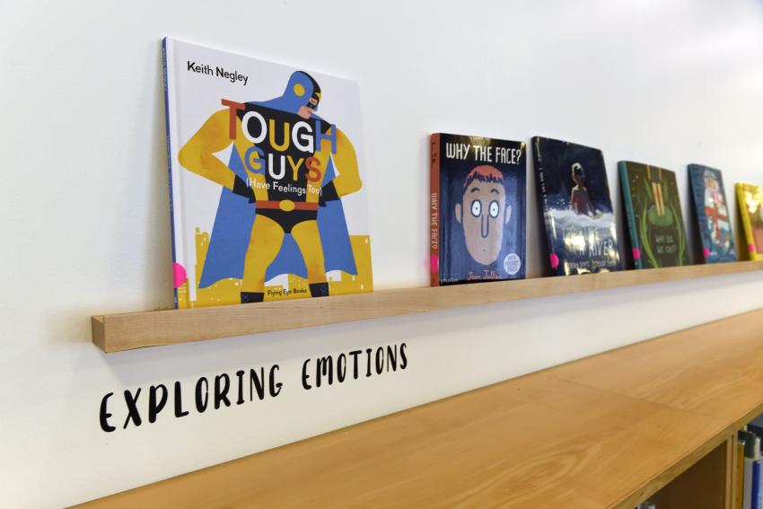 Installation image showing books on shelf. 