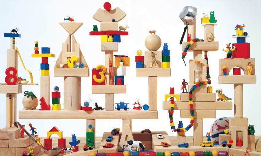 Photograph of toy blocks with figures. 