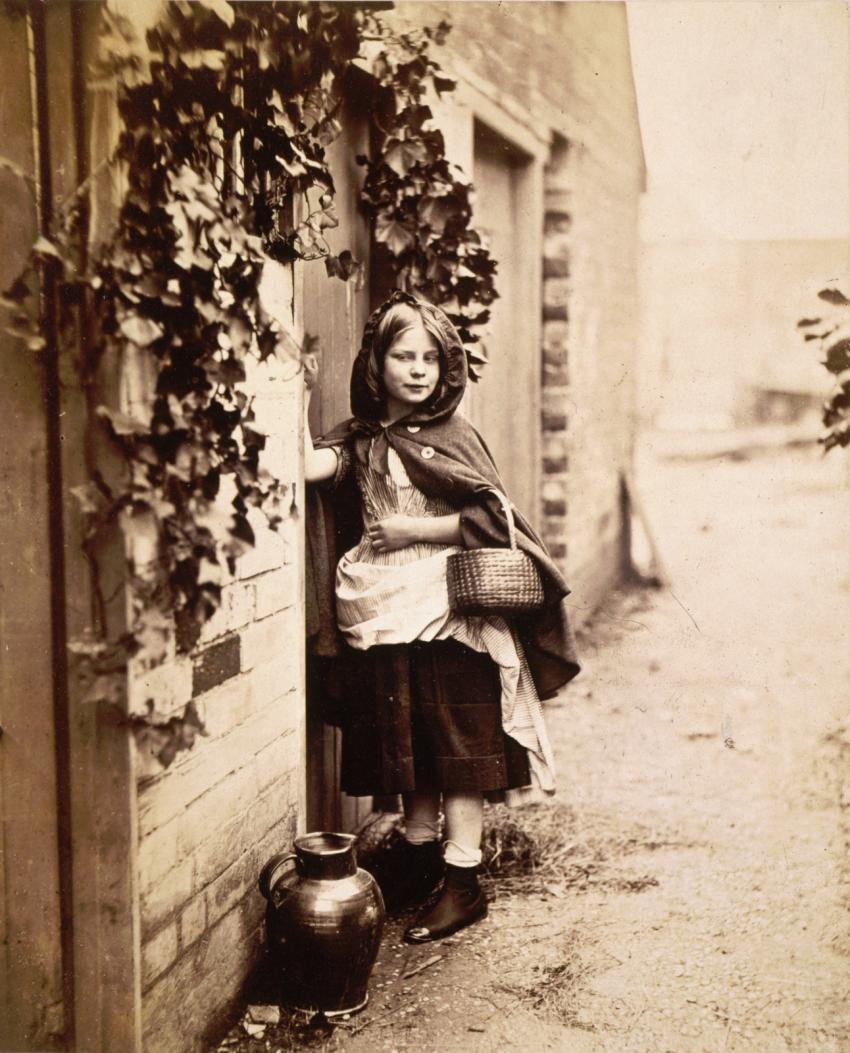 Photograph of girl holding basket 