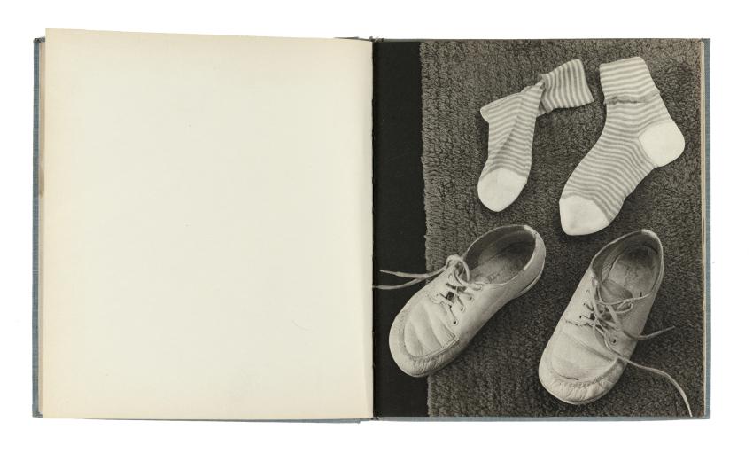 Photograph of book page showing shoe and socks