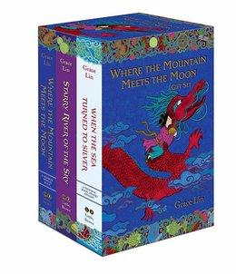 Image shows the complete set of three paperback books in the Where the Mountain Meets the Moon trilogy in a slipcase.