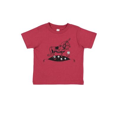 Red unisex youth t-shirt with image of a bull sniffing white flowers