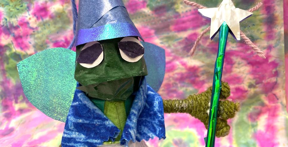 Fairy frog sculpture made from paper with star wand in hand