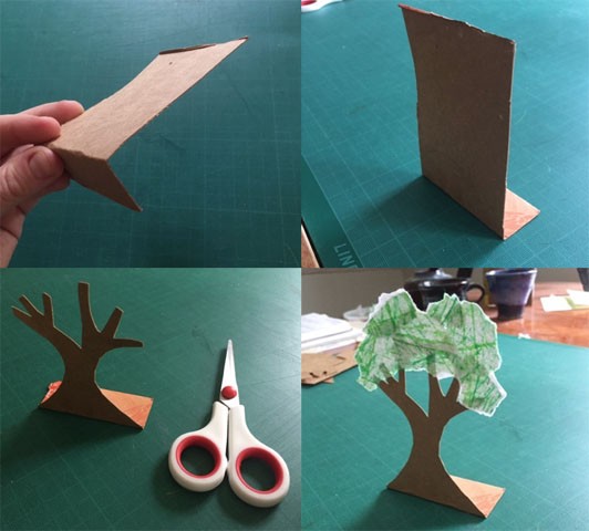 Square image containing four photographs. The first shows a piece of cardboard folded at a right angle. The second shows that piece of cardboard standing up on a tabletop, supported by the folded base. The third image shows a tree cut out of the cardboard standing on the base. The final image shows the same tree with leaves made out of textured green paper. 