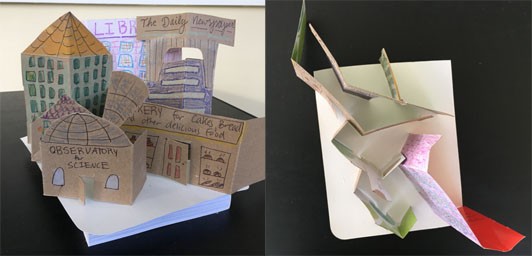 Two side by side images, the first showing a cardboard city from the front, the second shows the cardboard city from above, revealing how the cardboard is folded to allow the buildings to balance and stand up. 