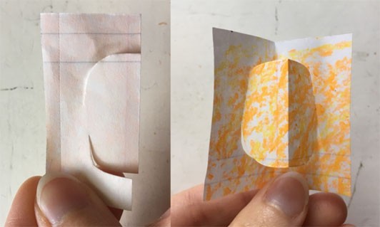 Two images showing how to make an oval pop-up. The one to the left shows the two cut, curved lines that start at the folded paper but do not meet. The one to the right shows the pop-up after the shape has been pushed through so an orange oval pops out of the card.