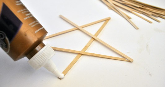 gluing wood and paper stars